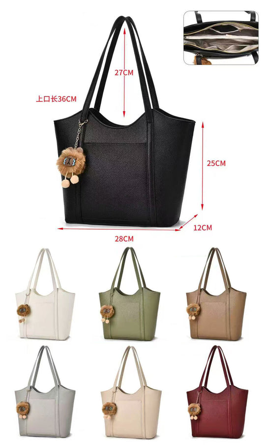 Cartera tipo bolso tamaño mediano, incluye llavero peluche