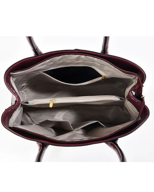 Bolso de mano en set de tres piezas con un monedero y un tarjetero a juego