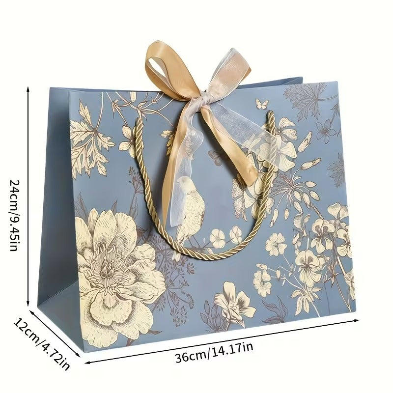 Bolsa de regalo en papel tamaño mediano • 36cm largo x 24cm alto