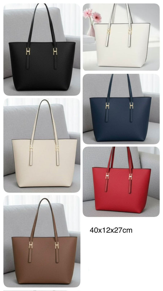Bolso espacioso con asas largas