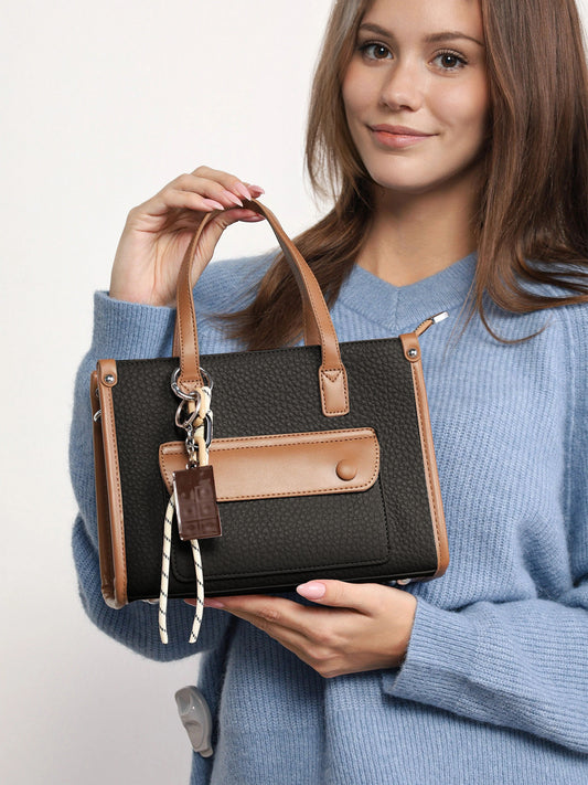 Cartera pequeña bicolor con bolsillo frontal