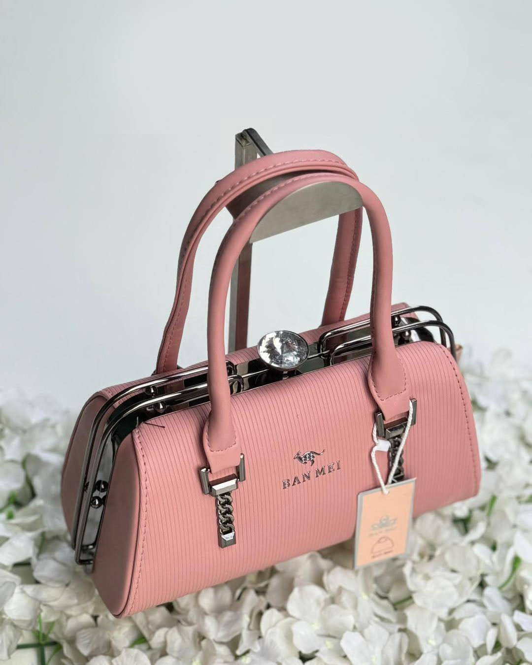Cartera lujosa tamaño compacto, cierre superior tipo broche