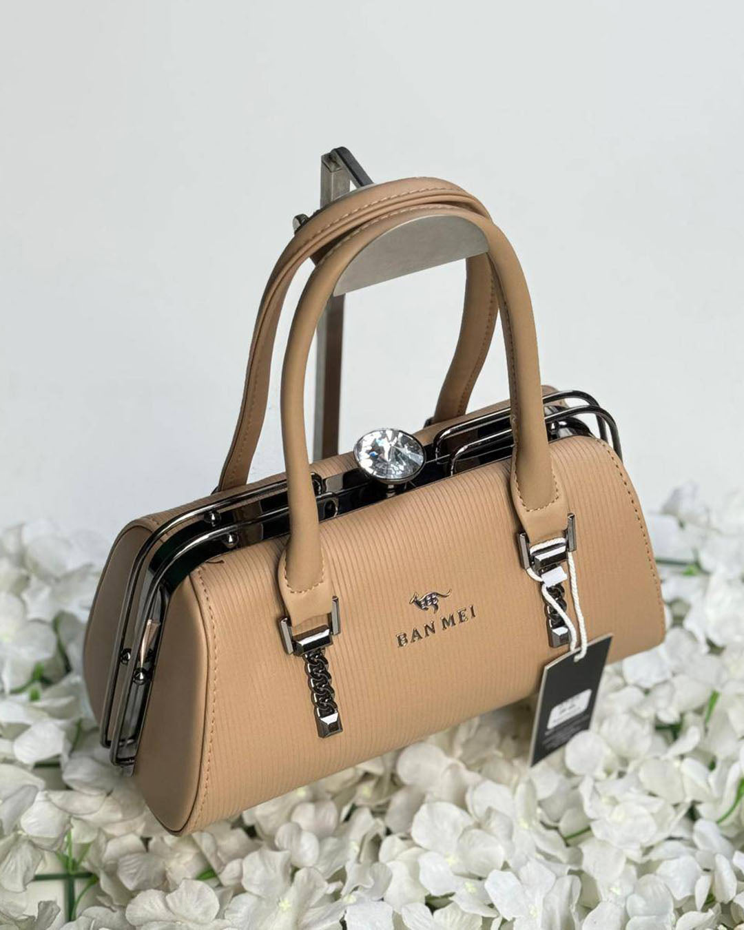 Cartera lujosa tamaño compacto, cierre superior tipo broche