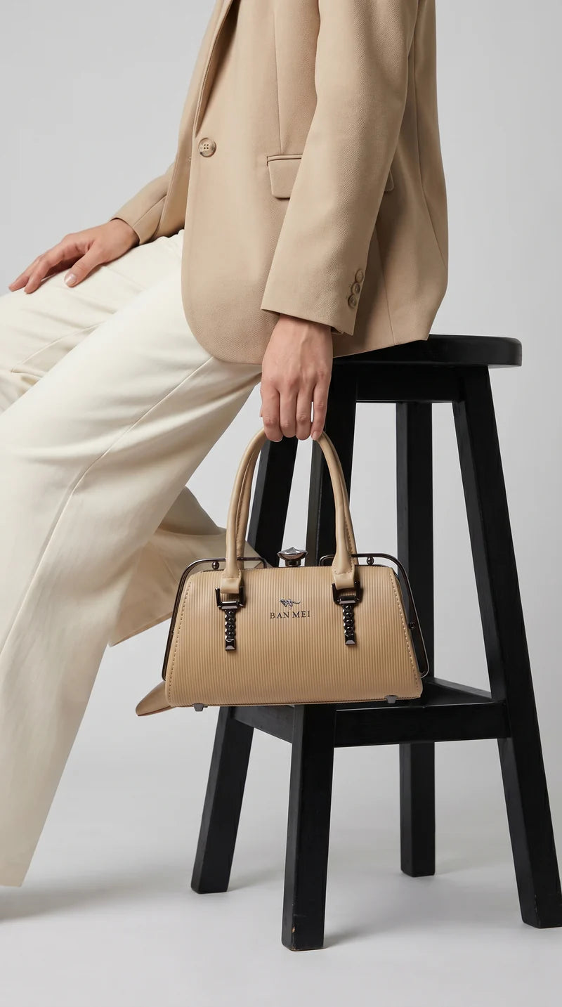Cartera lujosa tamaño compacto, cierre superior tipo broche