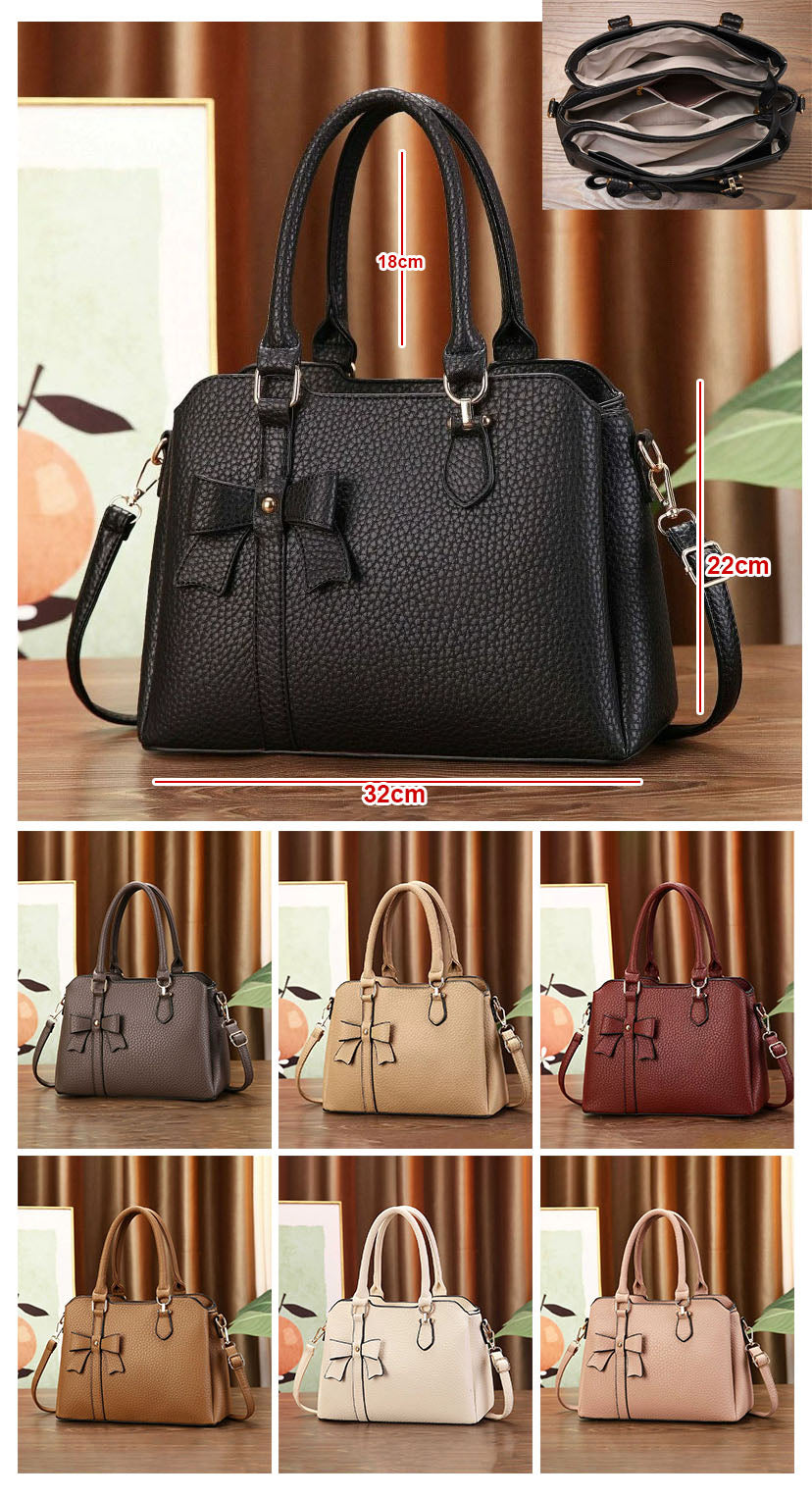 Cartera de mano en tamaño mediano con lazo frontal decorativo