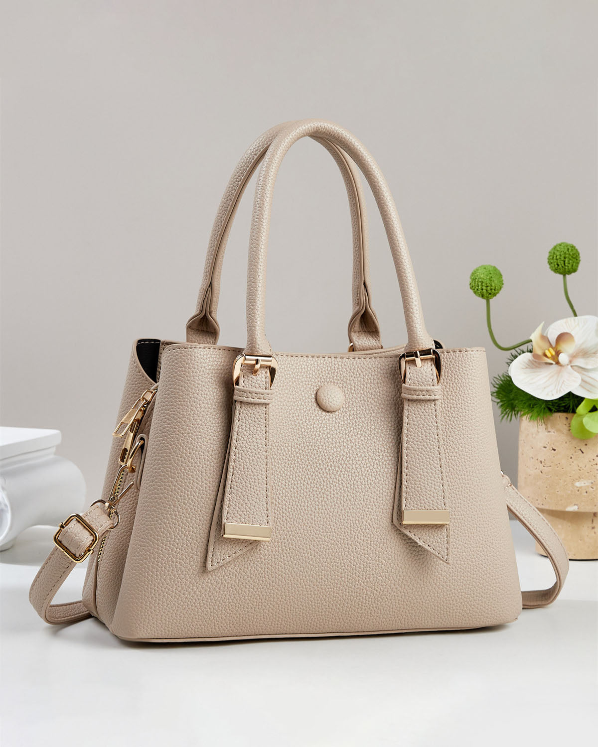 Bolso de mano y de hombro.