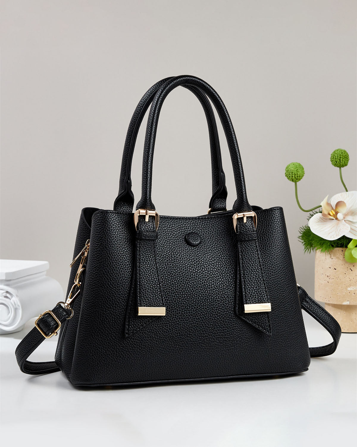 Bolso de mano y de hombro.