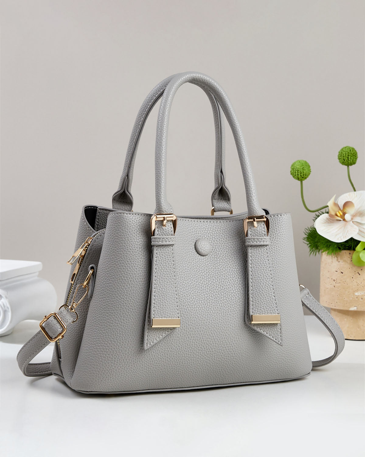 Bolso de mano y de hombro.