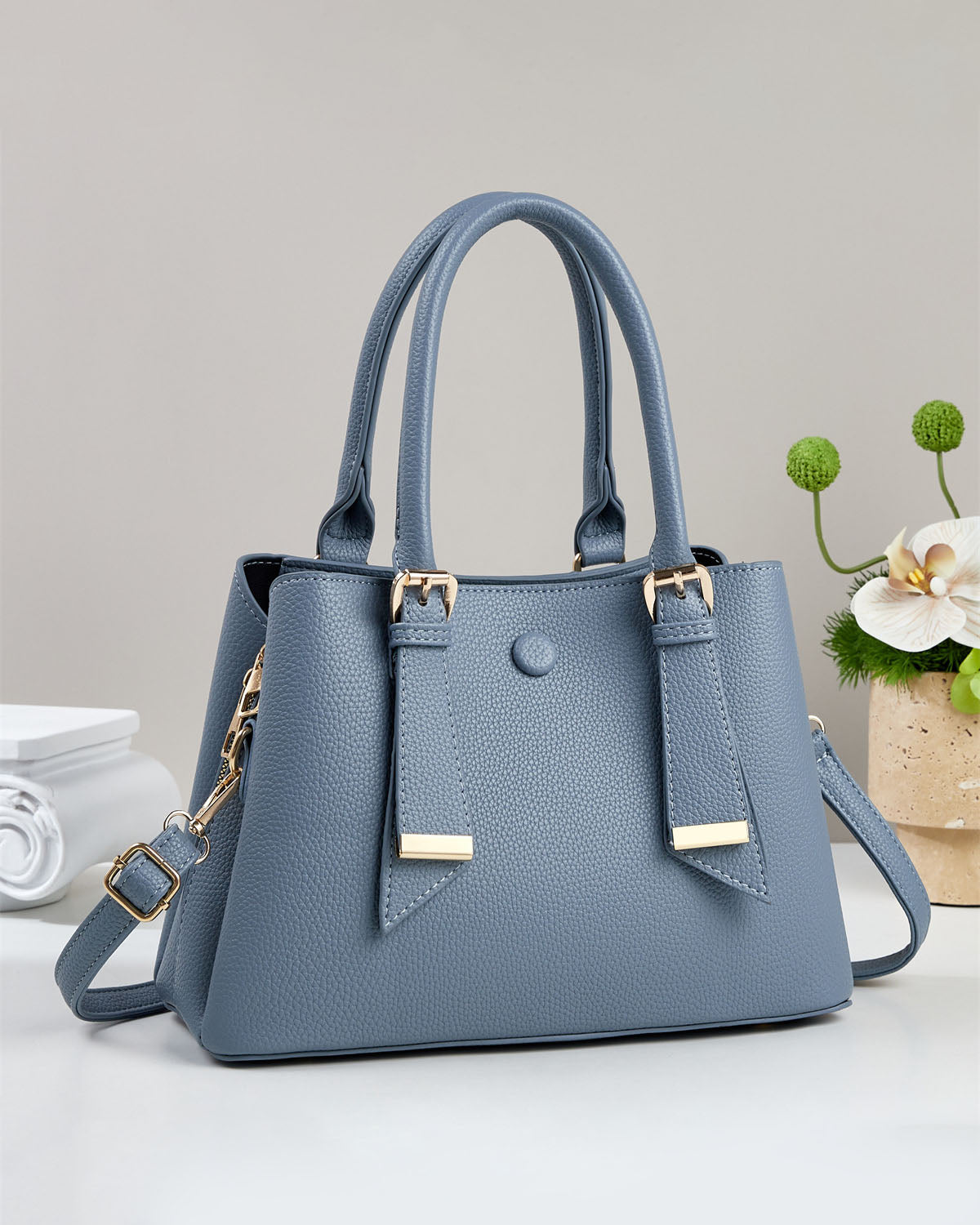 Bolso de mano y de hombro.