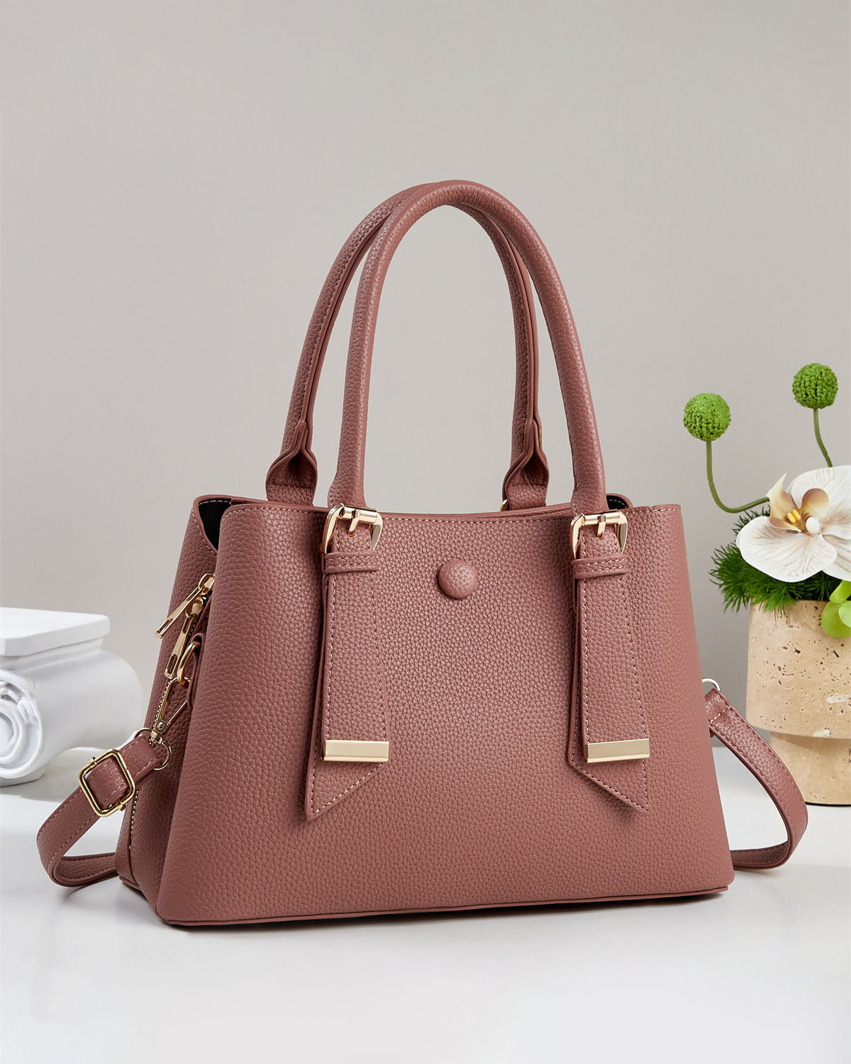 Bolso de mano y de hombro.