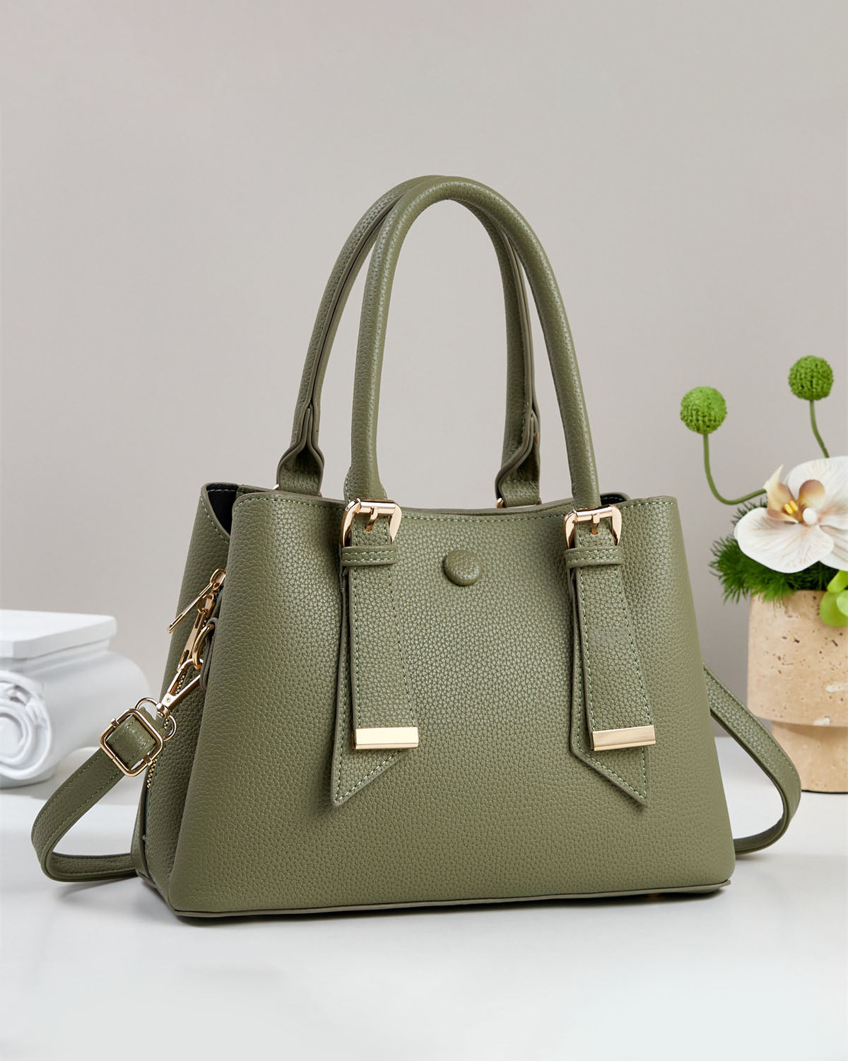 Bolso de mano y de hombro.