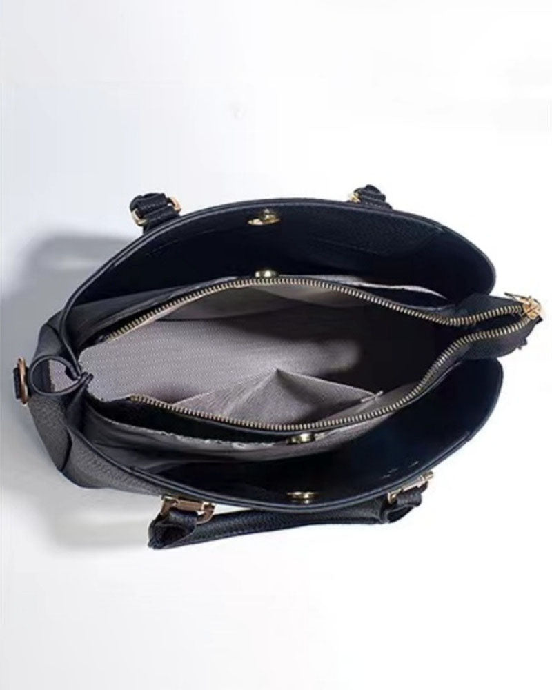 Bolso elegante de doble asa con aros decorativos