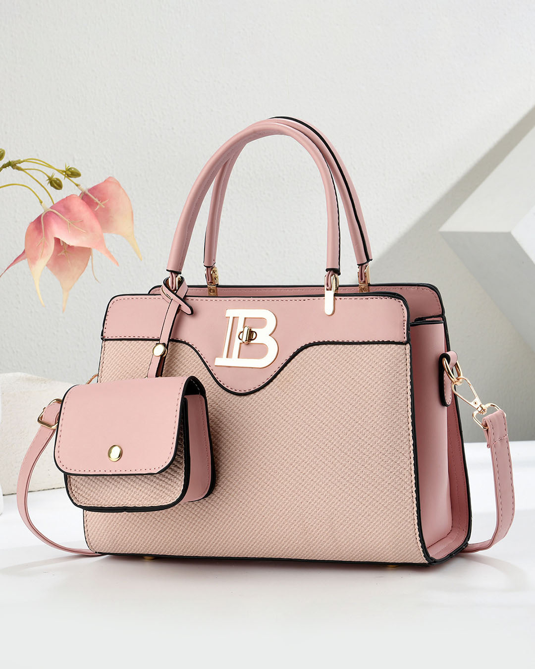 Conjunto de bolso mediano de mano y bolso pequeño con detalles en tono dorado