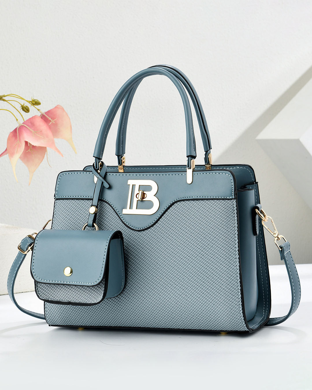 Conjunto de bolso mediano de mano y bolso pequeño con detalles en tono dorado