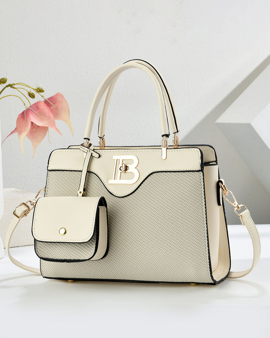 Conjunto de bolso mediano de mano y bolso pequeño con detalles en tono dorado