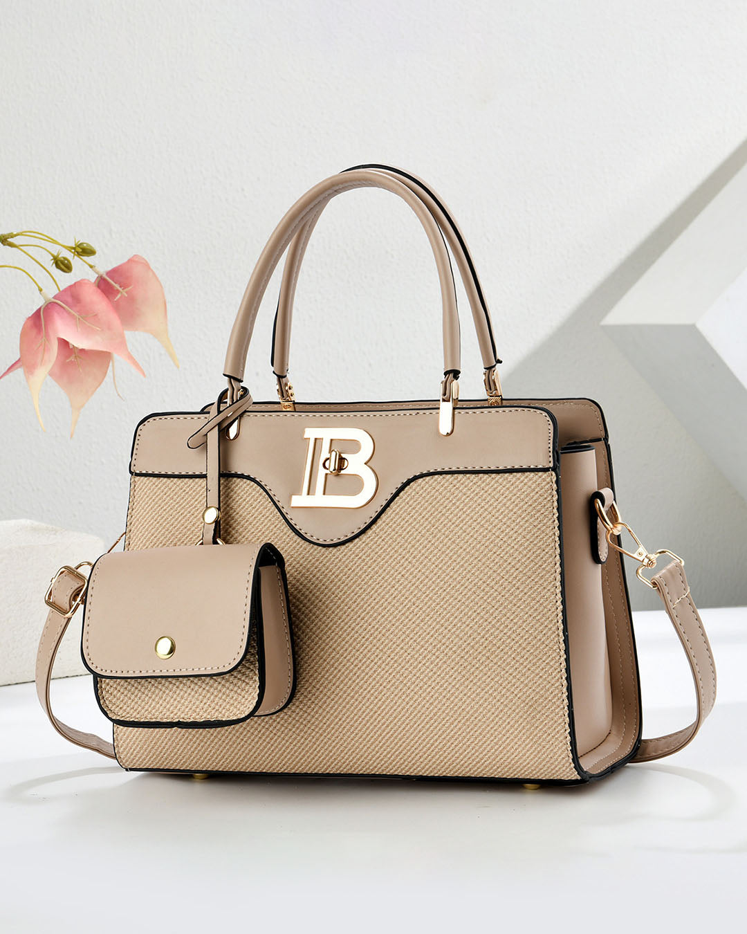Conjunto de bolso mediano de mano y bolso pequeño con detalles en tono dorado