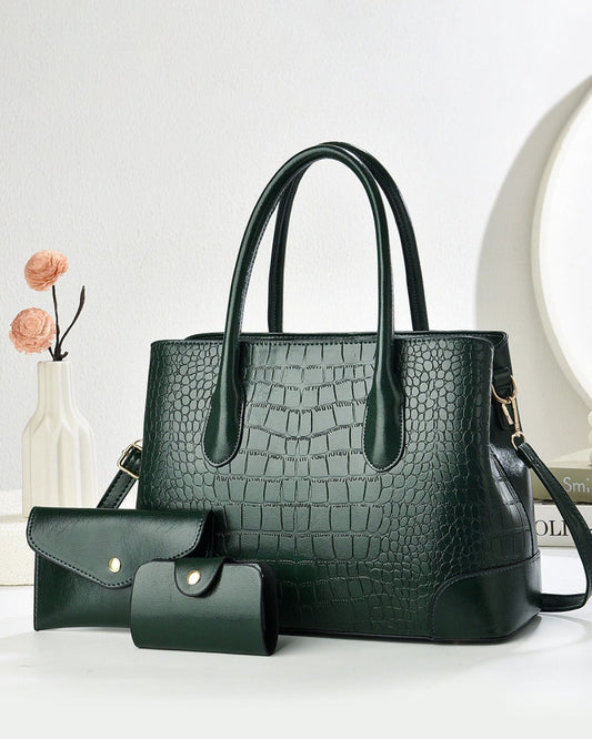 Bolso de mano en set de tres piezas con un monedero y un tarjetero a juego