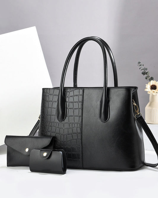 Cartera espaciosa con sobre y llavero tipo sobre