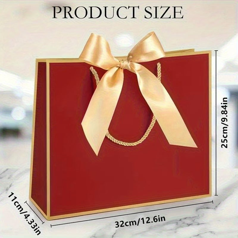 Bolsa de regalo en papel tamaño mediano • 32cm largo x 25cm alto