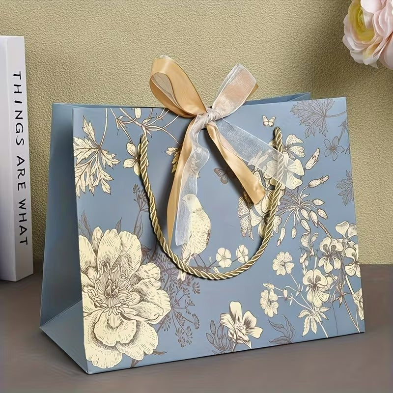 Bolsa de regalo en papel tamaño mediano • 36cm largo x 24cm alto