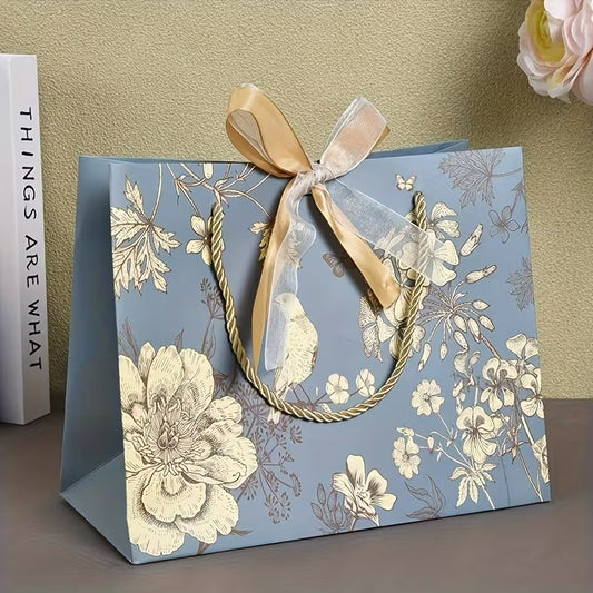 Bolsa de regalo en papel tamaño mediano • 36cm largo x 24cm alto