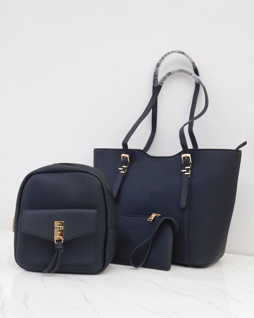 Combo tres piezas, mochila mini y sobre