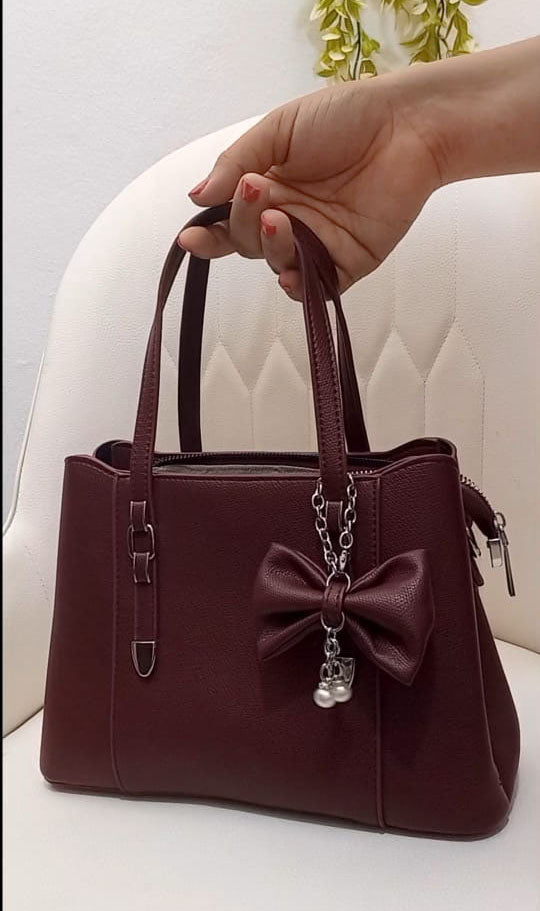 Mini Bag con lazo colgante decorativo