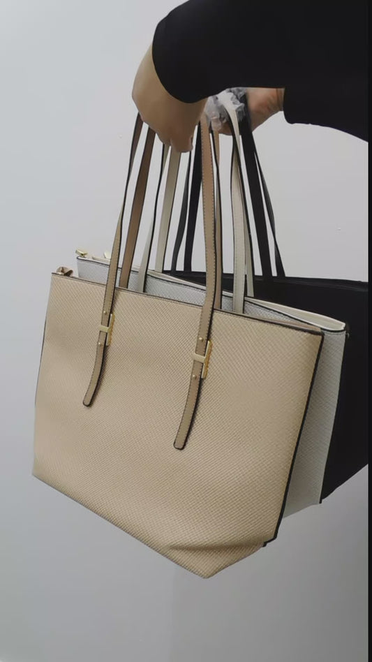 Bolso espacioso con asas largas